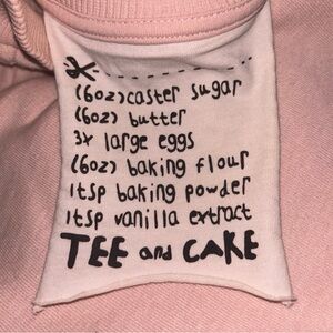 Light Pink “babygirl” sweatshirt (kind of like a turtleneck)